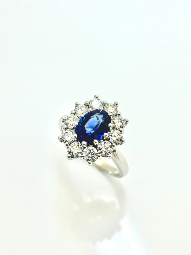 PLATINUM VINTAGE SAPPHIRE AND DIAMOND CLAW SET CLUSTER RING