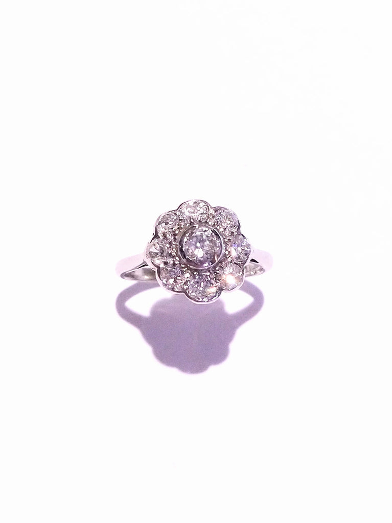 VINTAGE 1.00CTS DIAMOND DAISY CLUSTER IN PLATINUM RING