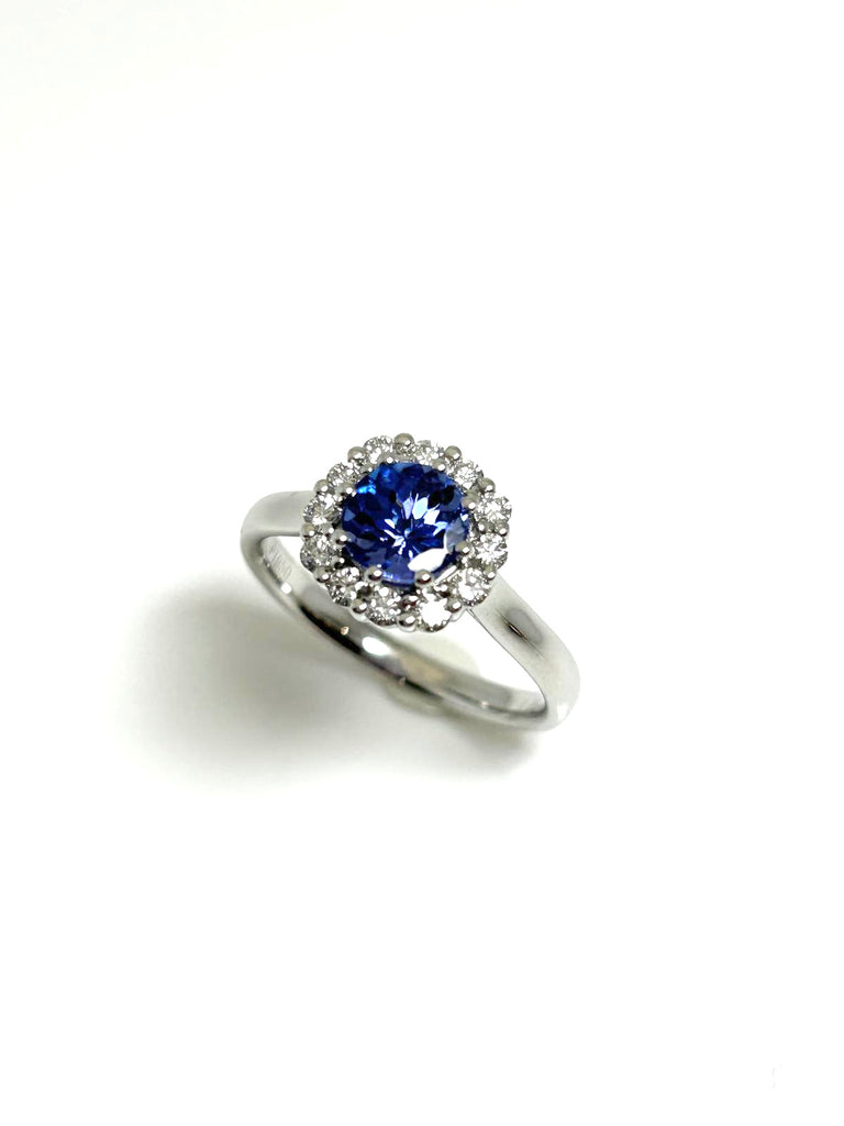 PLATINUM TANZANITE AND DIAMOND MODERN HALO RING