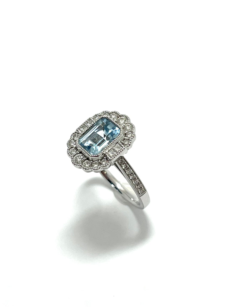 18CT EMERALD CUT AQUAMARINE DIAMOND RING