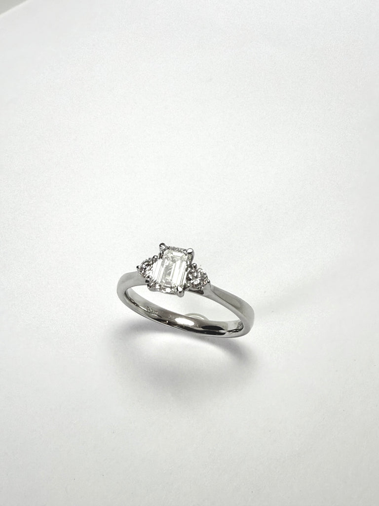 PLATINUM 87PT EMERALD CUT DIAMOND TRILOGY RING