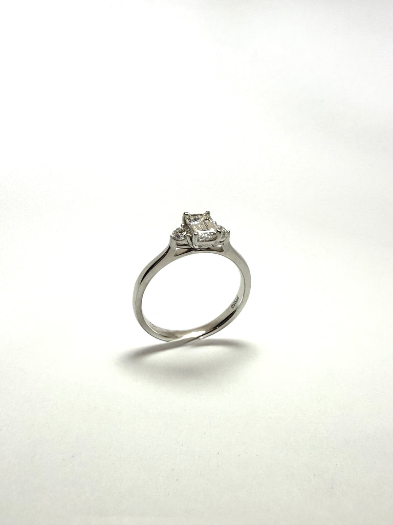 PLATINUM 87PT EMERALD CUT DIAMOND TRILOGY RING