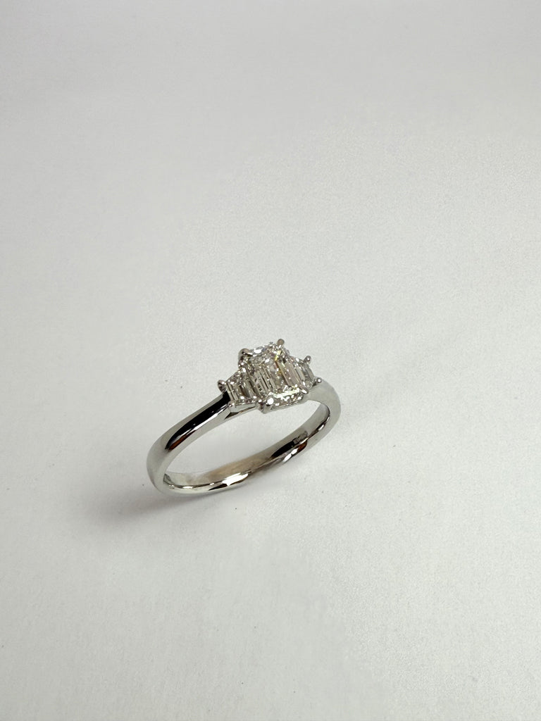 PLATINUM 93PT EMERALD CUT DIAMOND TRILOGY RING