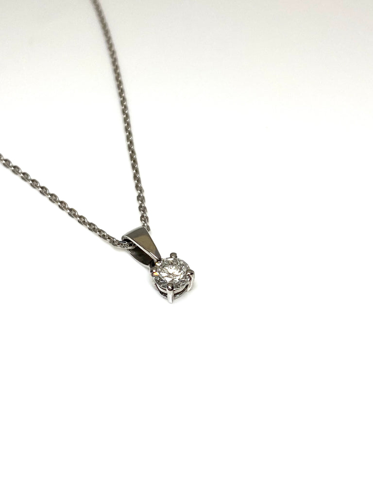 18CT 42PT DIAMOND SOLITAIRE PENDANT AND 9CT CHAIN