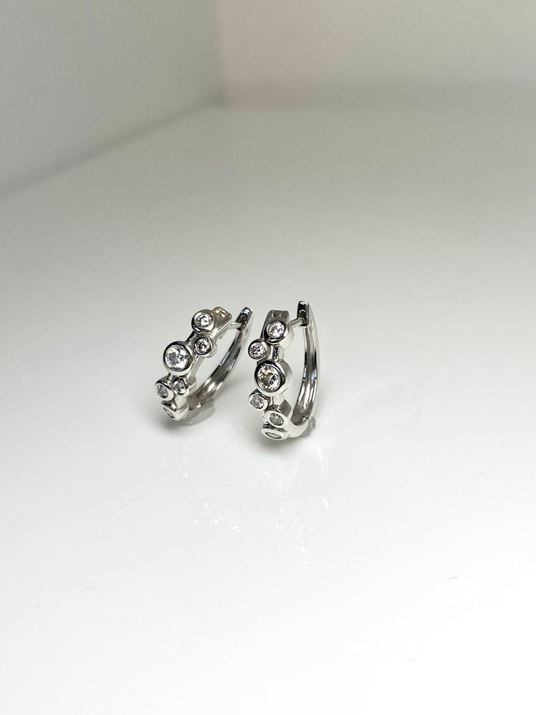 18CT RAINDANCE HOOPS WITH 38PT OF DIAMONDS
