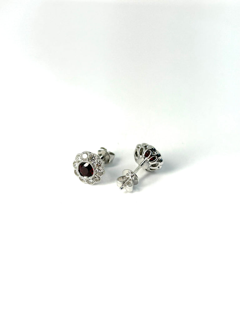 18CT WHITE GOLD RUBY AND DIAMOND RING