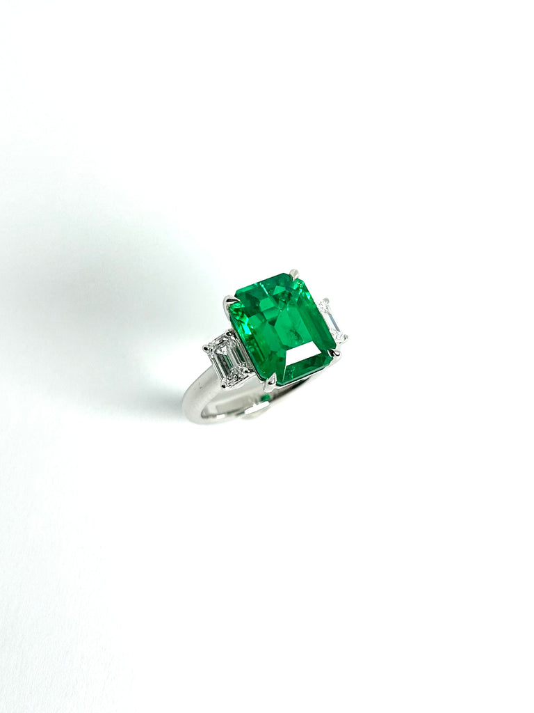 PLATINUM LAB GROWN 5.28CT EMERALD AND DIAMOND TRILOGY RING