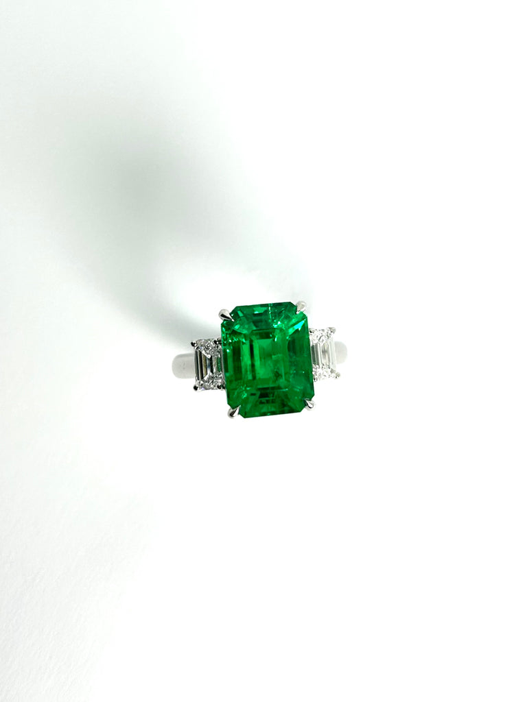 PLATINUM LAB GROWN 5.28CT EMERALD AND DIAMOND TRILOGY RING