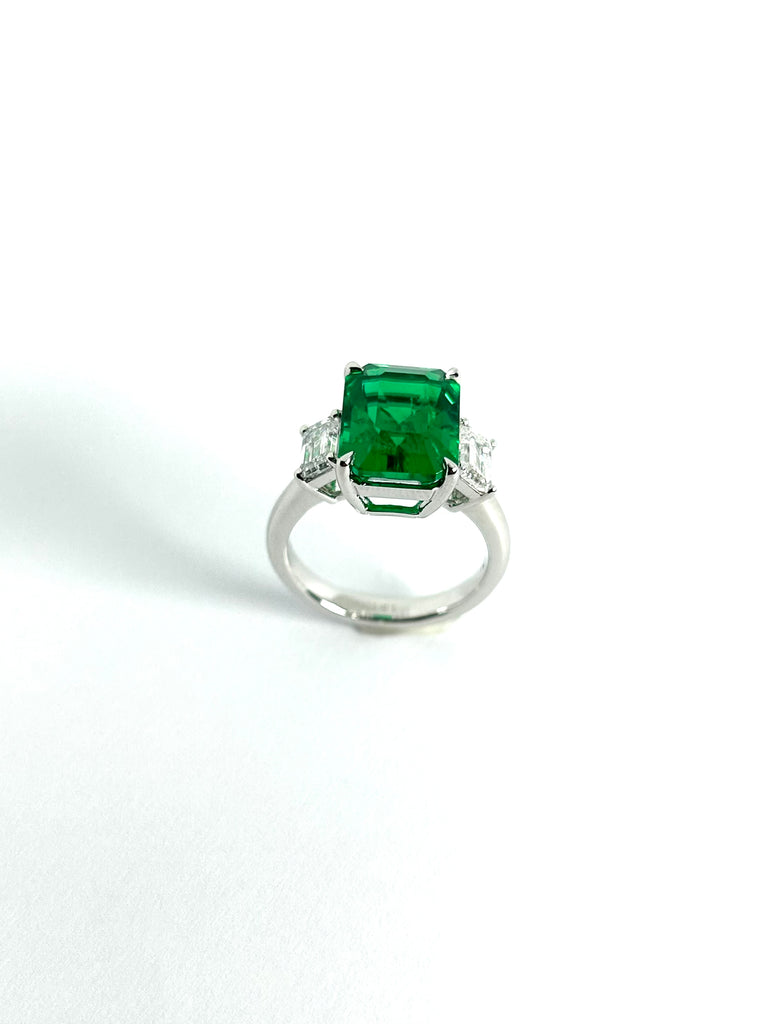 PLATINUM LAB GROWN 5.28CT EMERALD AND DIAMOND TRILOGY RING