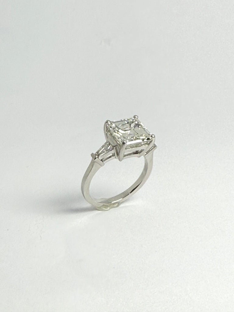 PLATINUM 5.20CT ASSCHER CUT DIAMOND RING WITH DIAMOND SHOULDERS