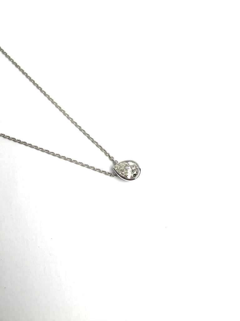 18CT 29PT PEAR SHAPED BEZEL SET DIAMOND PENDANT
