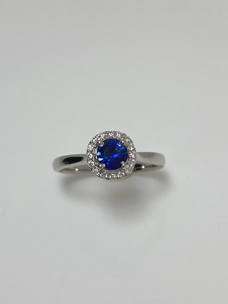 PLATINUM 50PT SAPPHIRE AND 15PTS DIAMOND HALO RING