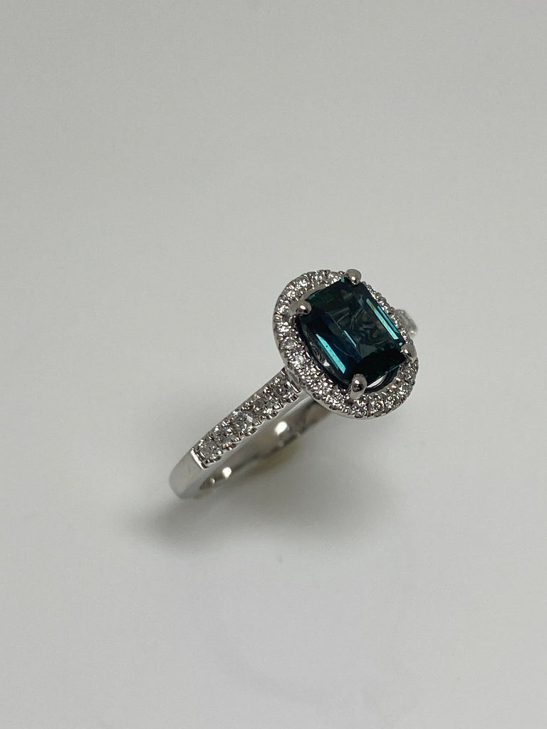 1.09CT TEAL SAPPHIRE AND 30PT DIAMOND HALO PLATINUM RING