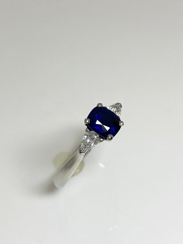 TRILOGY 75PT SAPPHIRE AND 24PT DIAMOND PLATINUM RING