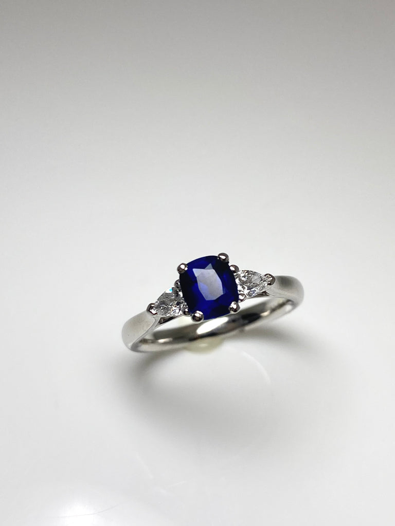 TRILOGY 75PT SAPPHIRE AND 24PT DIAMOND PLATINUM RING