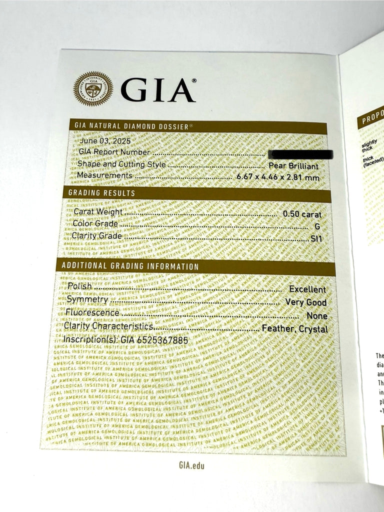 18CT 1.00CT PEAR DIAMOND DROPS