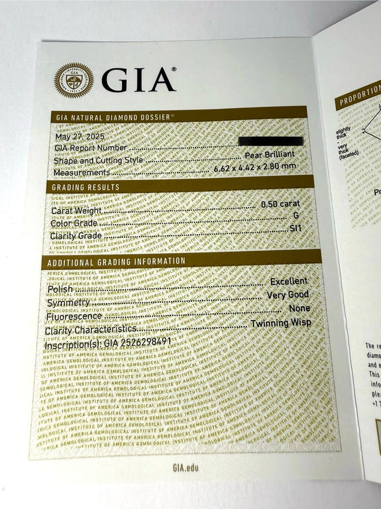 18CT 1.00CT PEAR DIAMOND DROPS