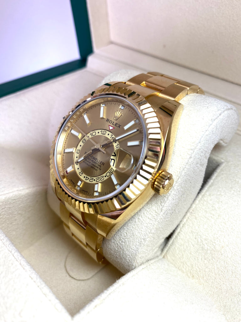 18CT GOLD ROLEX SKY DWELLER 42MM