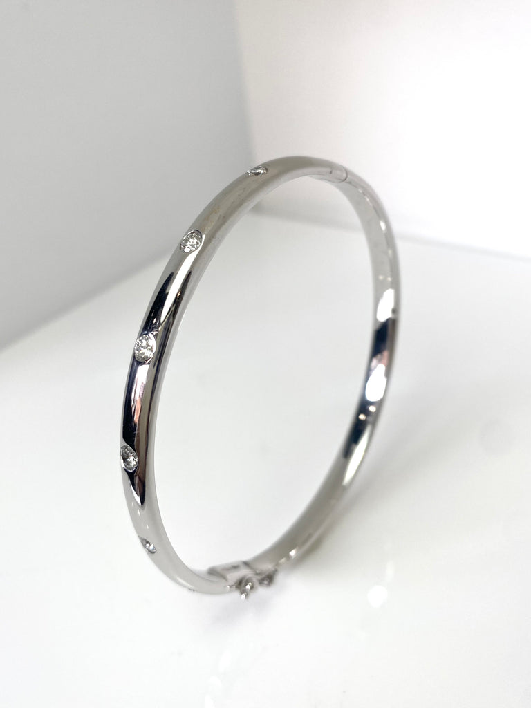 9CT SOLID WHITE GOLD DIAMOND SET BANGLE