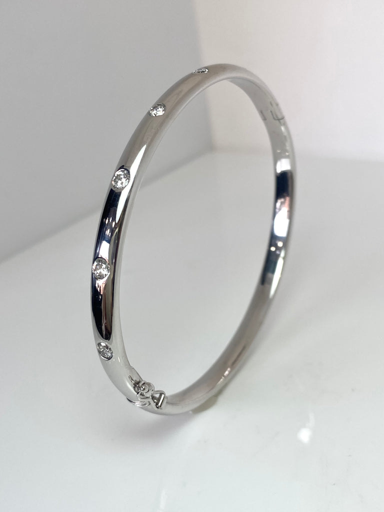 9CT SOLID WHITE GOLD DIAMOND SET BANGLE