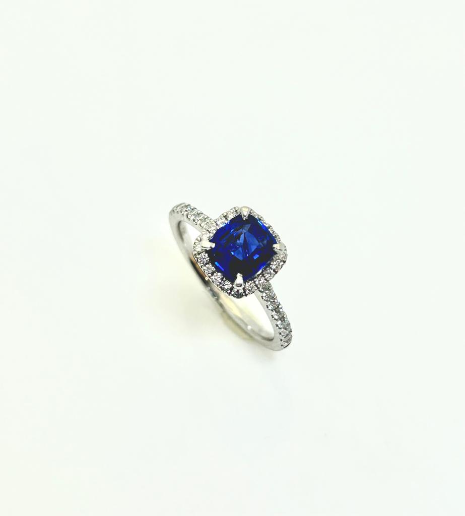 PLATINUM CUSHION CUT 1.35CT SAPPHIRE AND 40PT DIAMOND RING