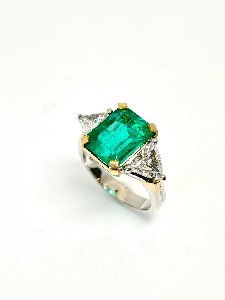 18CT WHITE GOLD 6.05CTS COLUMBIAN EMERALD AND 2.00CT DIAMOND RING