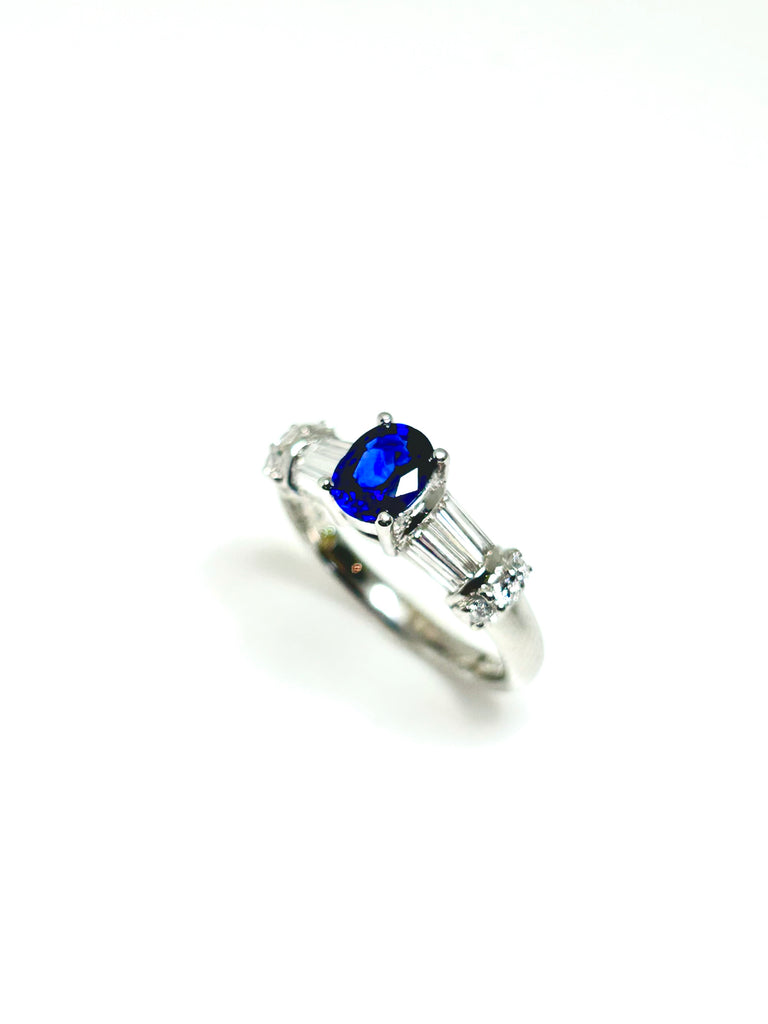 PLATINUM SAPPHIRE AND BAGUETTE DIAMOND RING