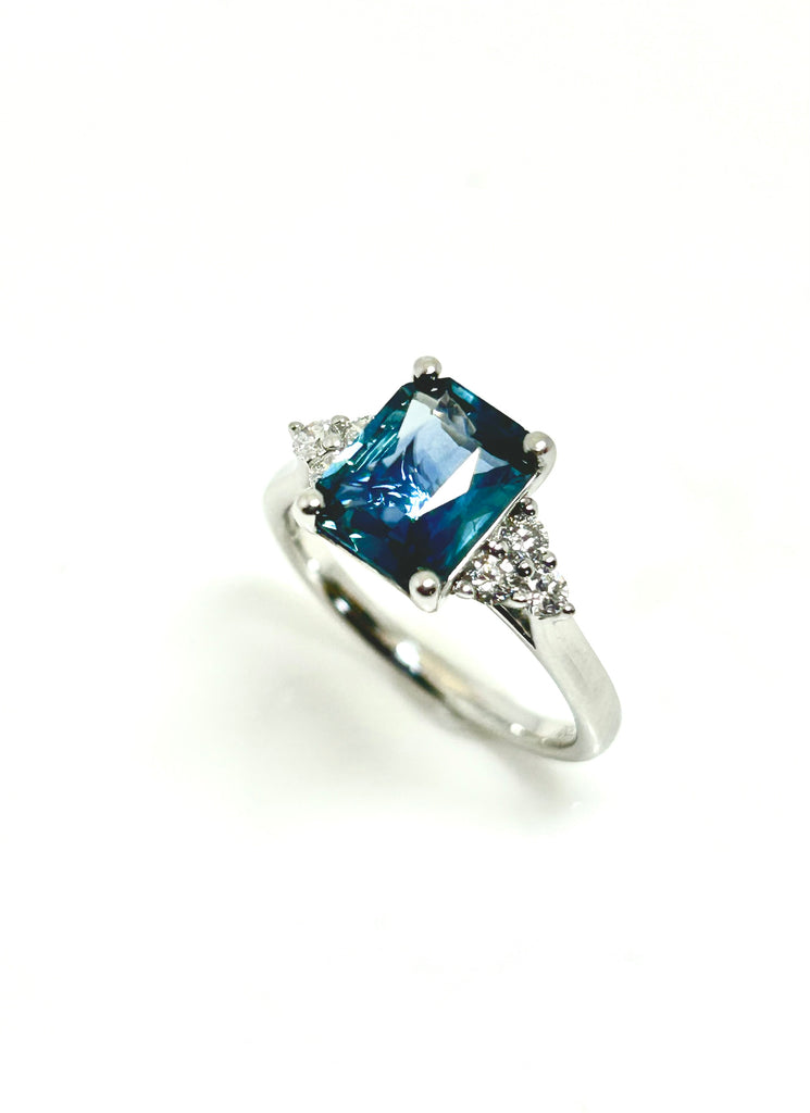 2.15CT TEAL SAPPHIRE AND DIAMOND RING 0.25 PLATINUM