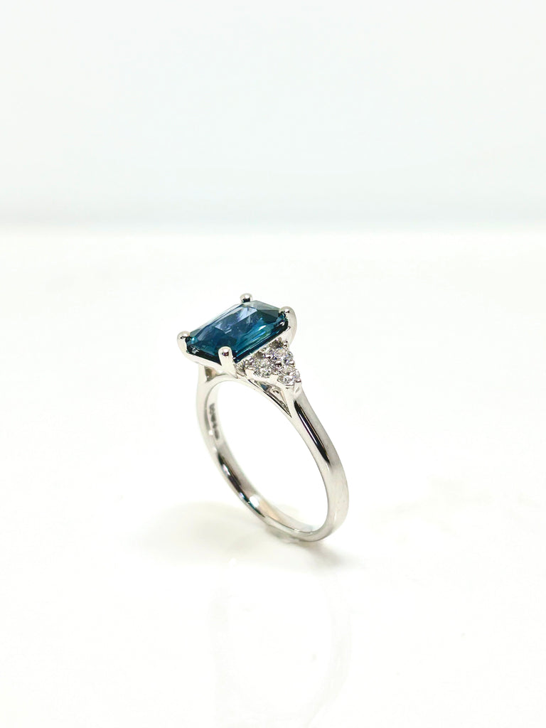 2.15CT TEAL SAPPHIRE AND DIAMOND RING 0.25 PLATINUM