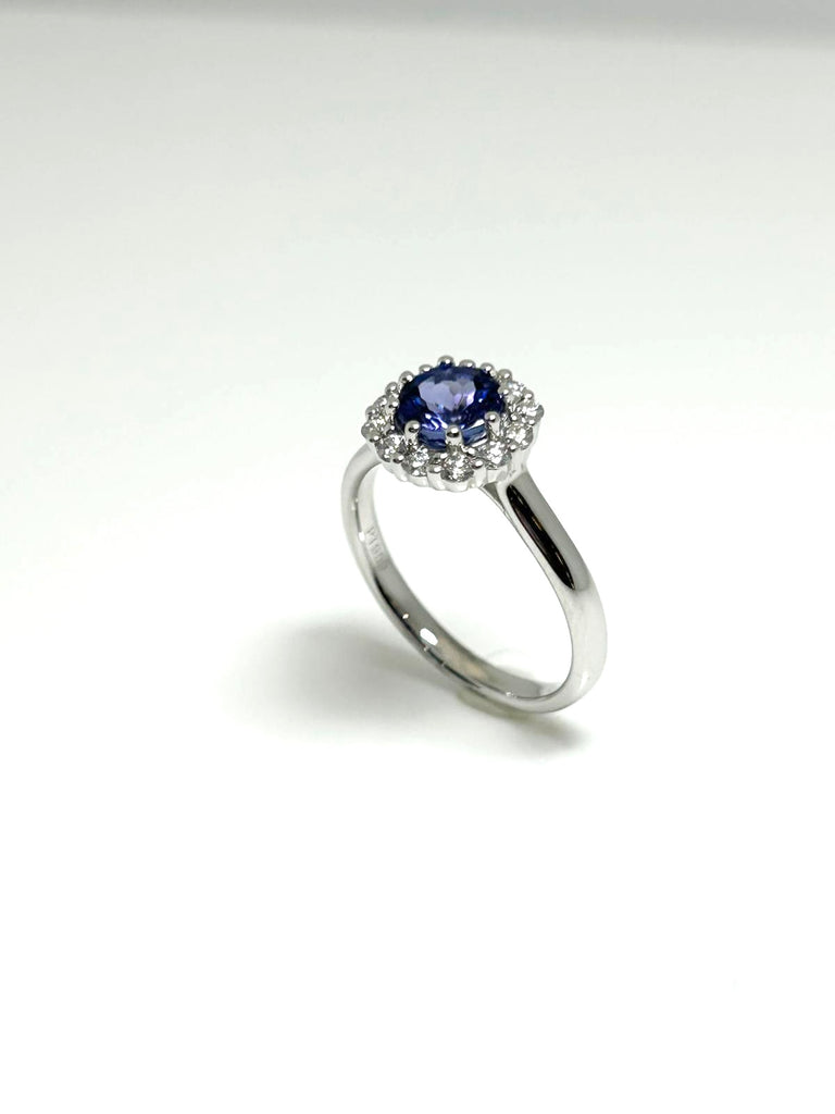 PLATINUM TANZANITE AND DIAMOND MODERN HALO RING