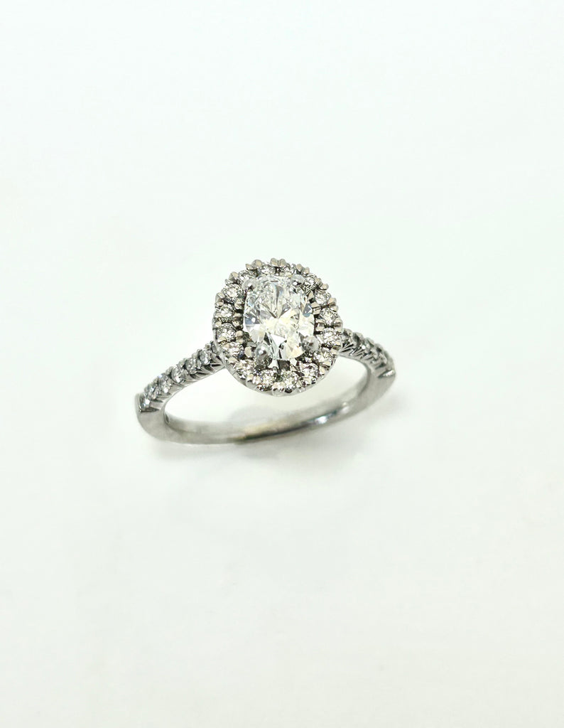 PLATINUM OVAL 95PT TOTAL HALO AND SHOULDERS DIAMOND RING