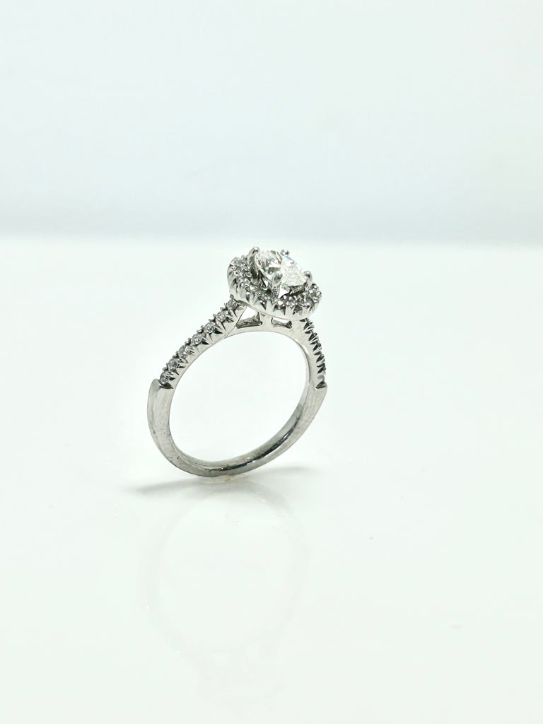 PLATINUM OVAL 95PT TOTAL HALO AND SHOULDERS DIAMOND RING