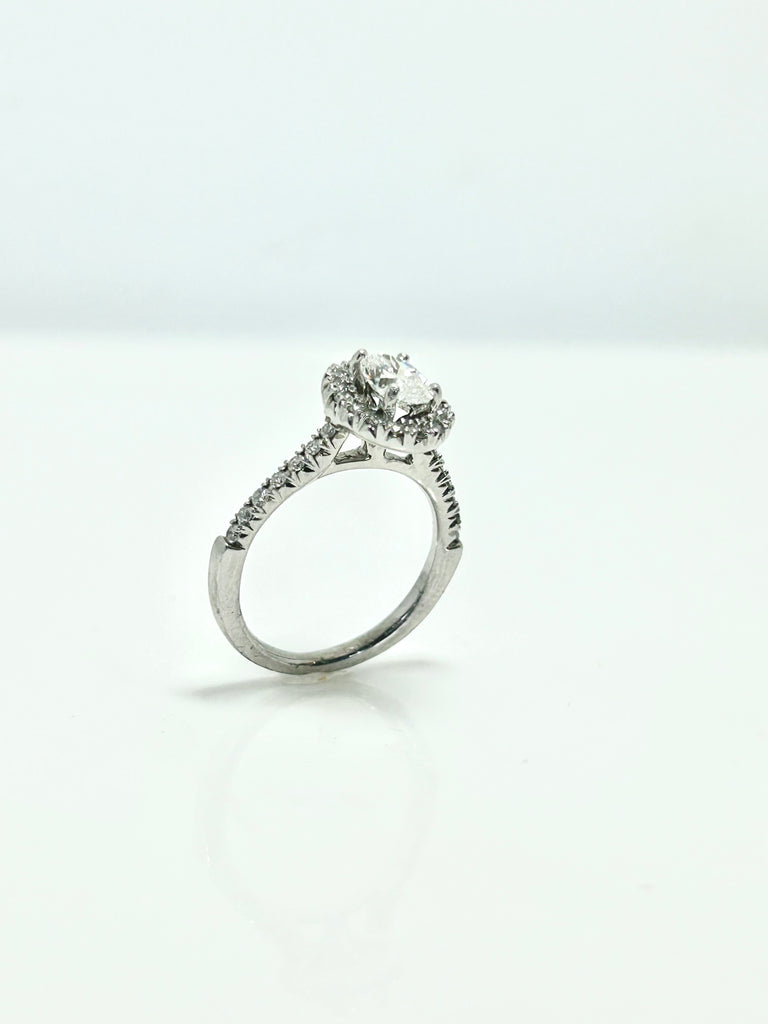 PLATINUM OVAL 95PT TOTAL HALO AND SHOULDERS DIAMOND RING