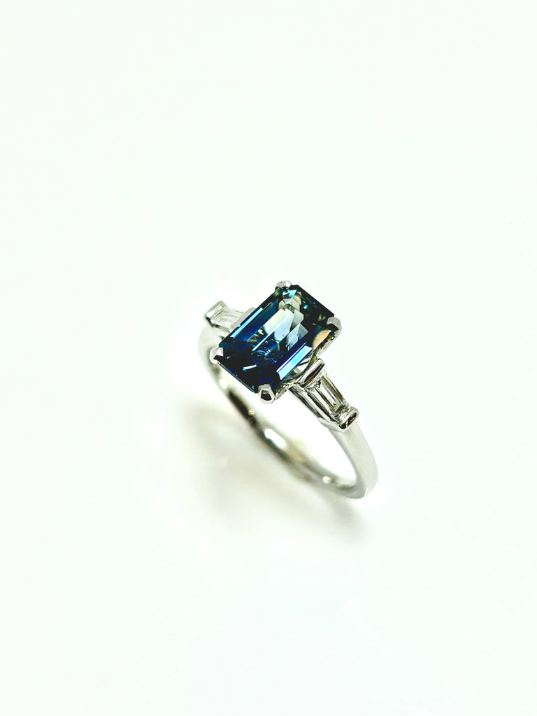 PLATINUM EMERALD CUT TEAL AND BAGUETTE DIAMOND RING