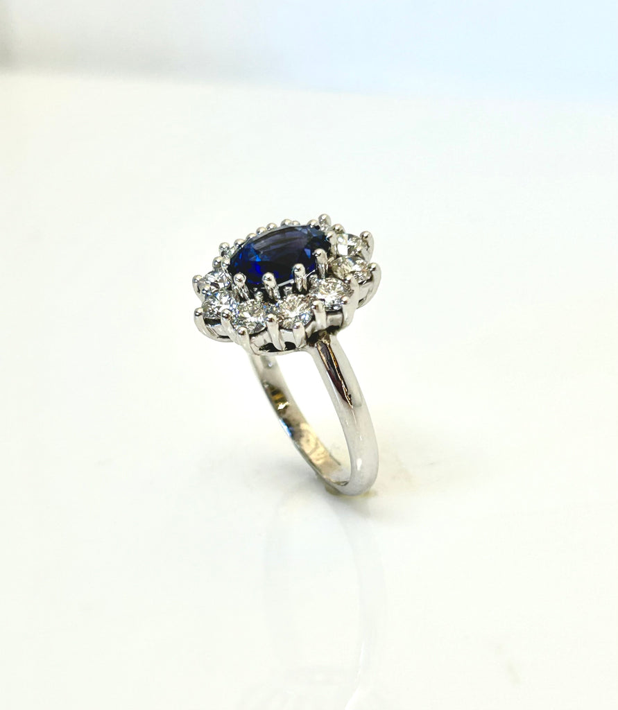 PLATINUM VINTAGE SAPPHIRE AND DIAMOND CLAW SET CLUSTER RING