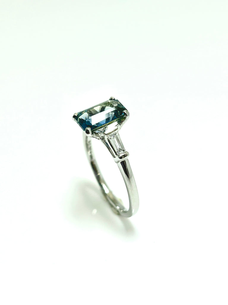 PLATINUM EMERALD CUT TEAL AND BAGUETTE DIAMOND RING