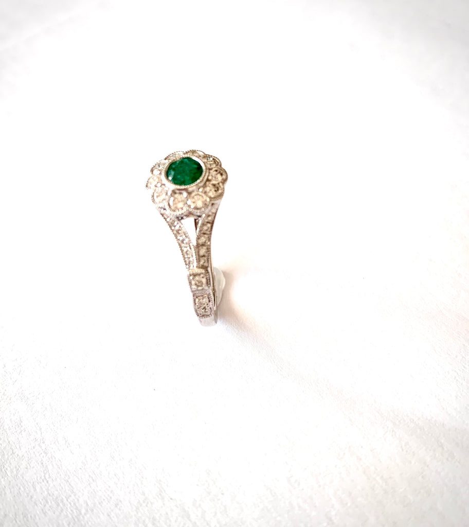 18CT WHITE GOLD EMERALD AND DIAMOND RING