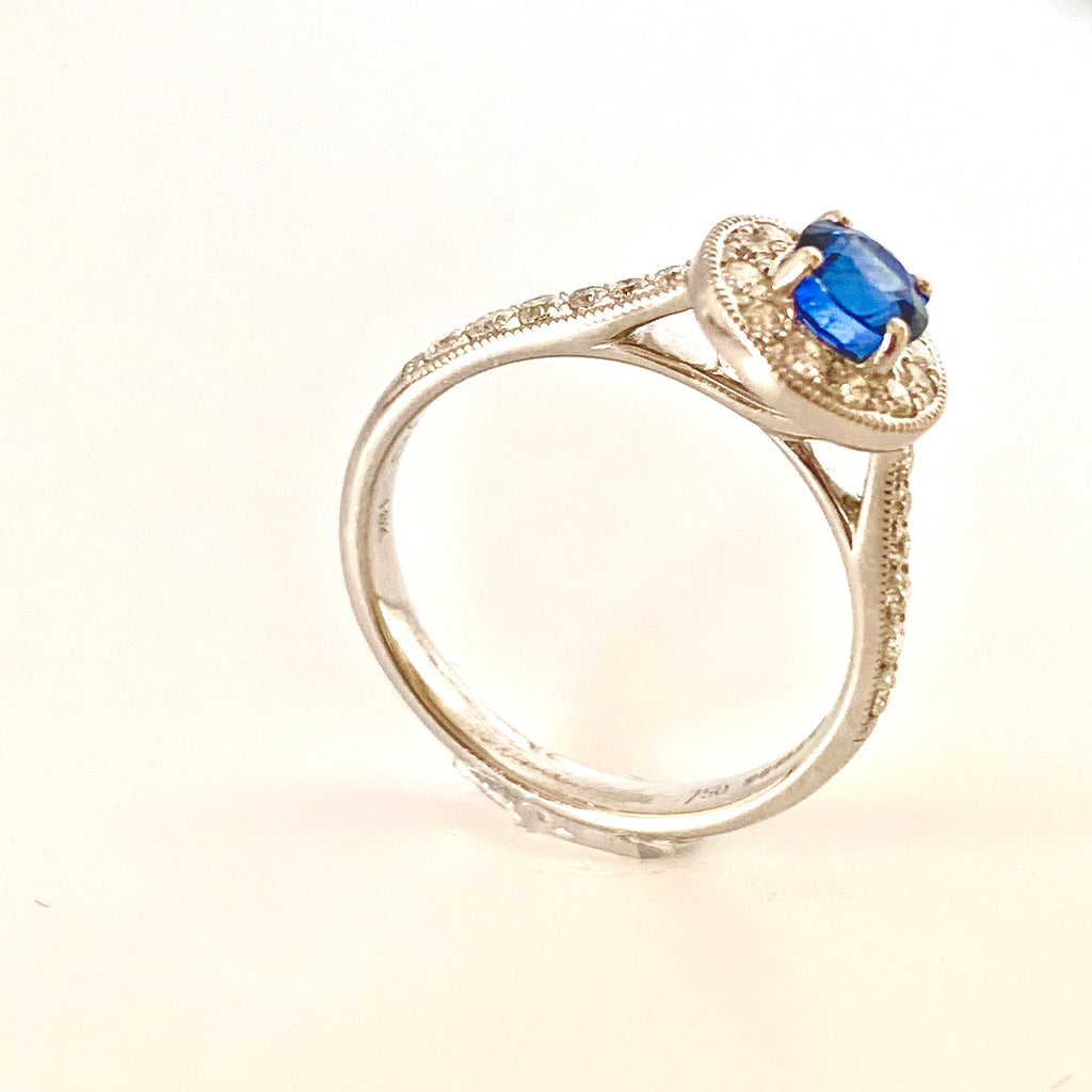 18CT WHITE GOLD SAPPHIRE DIAMOND HALO RING