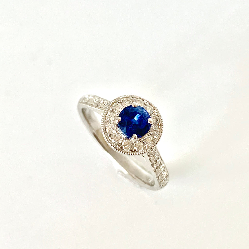 18CT WHITE GOLD SAPPHIRE DIAMOND HALO RING