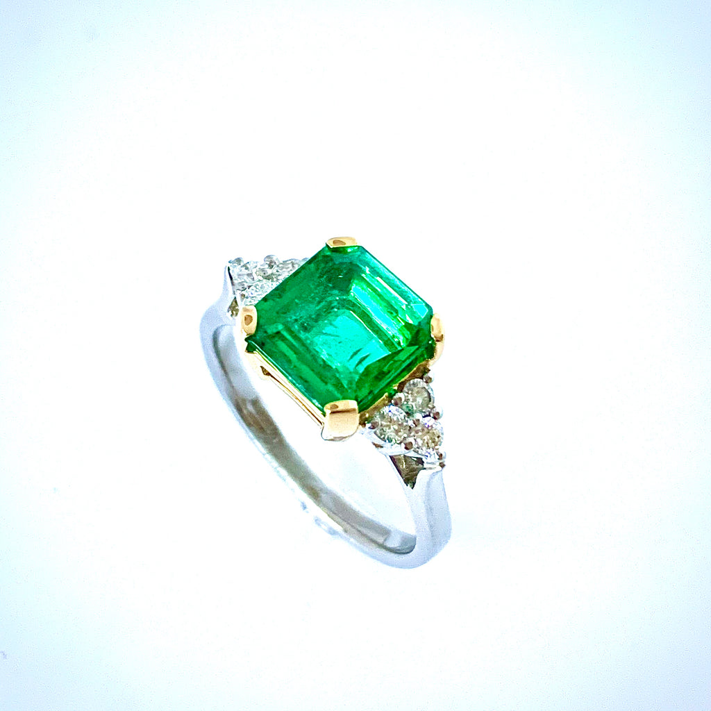 EXCITING ZAMBIAN EMERALD AND DIAMOND RING