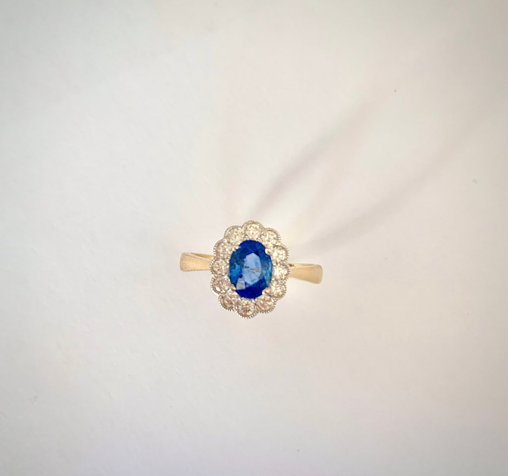 18CT YELLOW GOLD SAPPHIRE AND DIAMOND RING