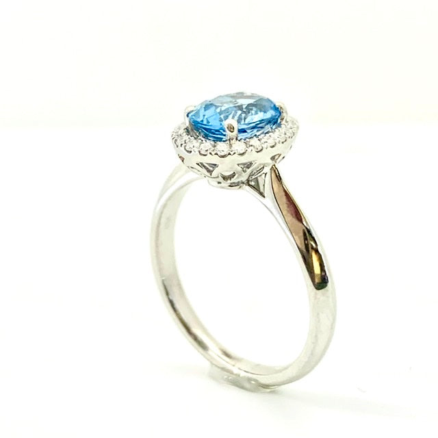 PLATINUM AQUAMARINE DIAMOND HALO RING