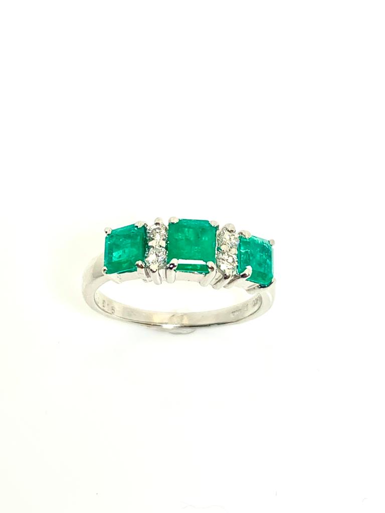 PLATINUM EMERALD AND DIAMOND RING