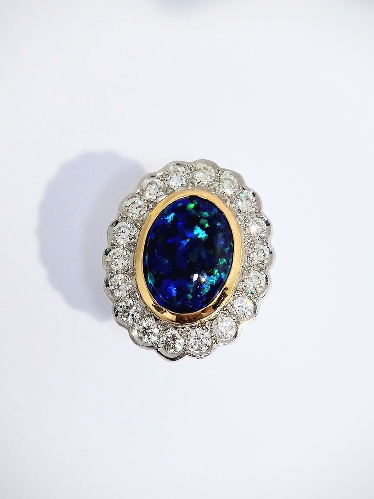 PLATINUM 6CT BLACK OPAL AND 2CTS DIAMOND RING