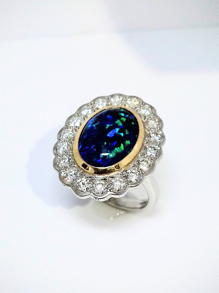 PLATINUM 6CT BLACK OPAL AND 2CTS DIAMOND RING