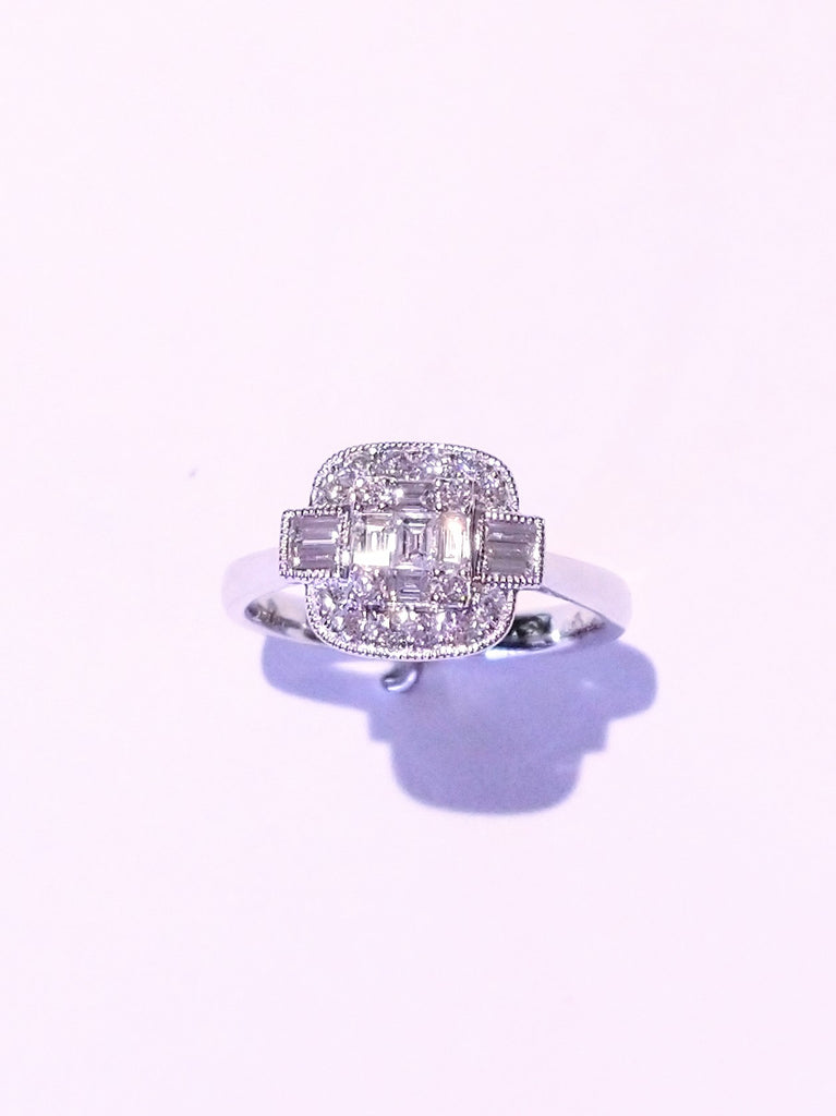 DIAMOND BAGUETTE AND ROUND BRILLIANT CLUSTER 0.60CTS SET IN PLATINUM RING