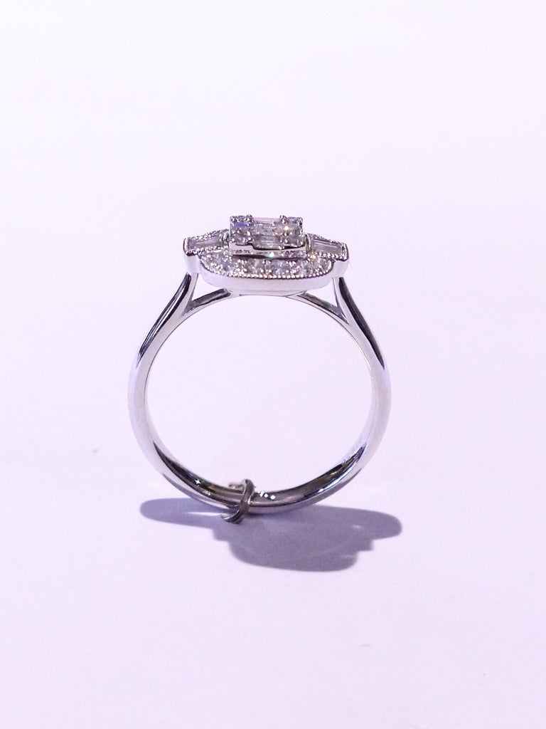 DIAMOND BAGUETTE AND ROUND BRILLIANT CLUSTER 0.60CTS SET IN PLATINUM RING