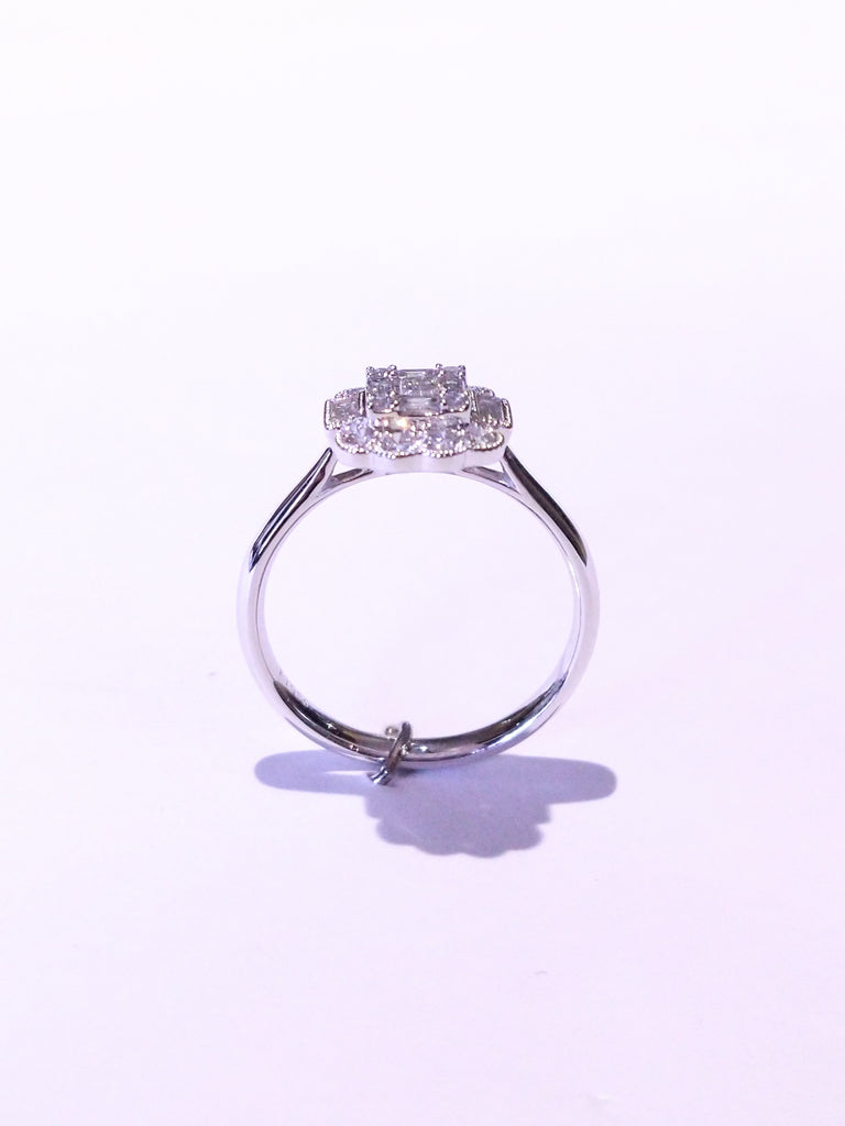 DIAMOND BAGUETTE AND ROUND BRILLIANT CLUSTER 0.62CTS SET IN PLATINUM RING