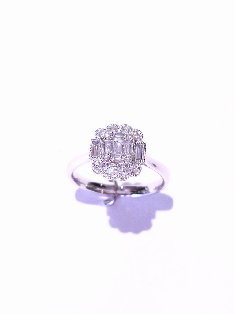DIAMOND BAGUETTE AND ROUND BRILLIANT CLUSTER 0.62CTS SET IN PLATINUM RING