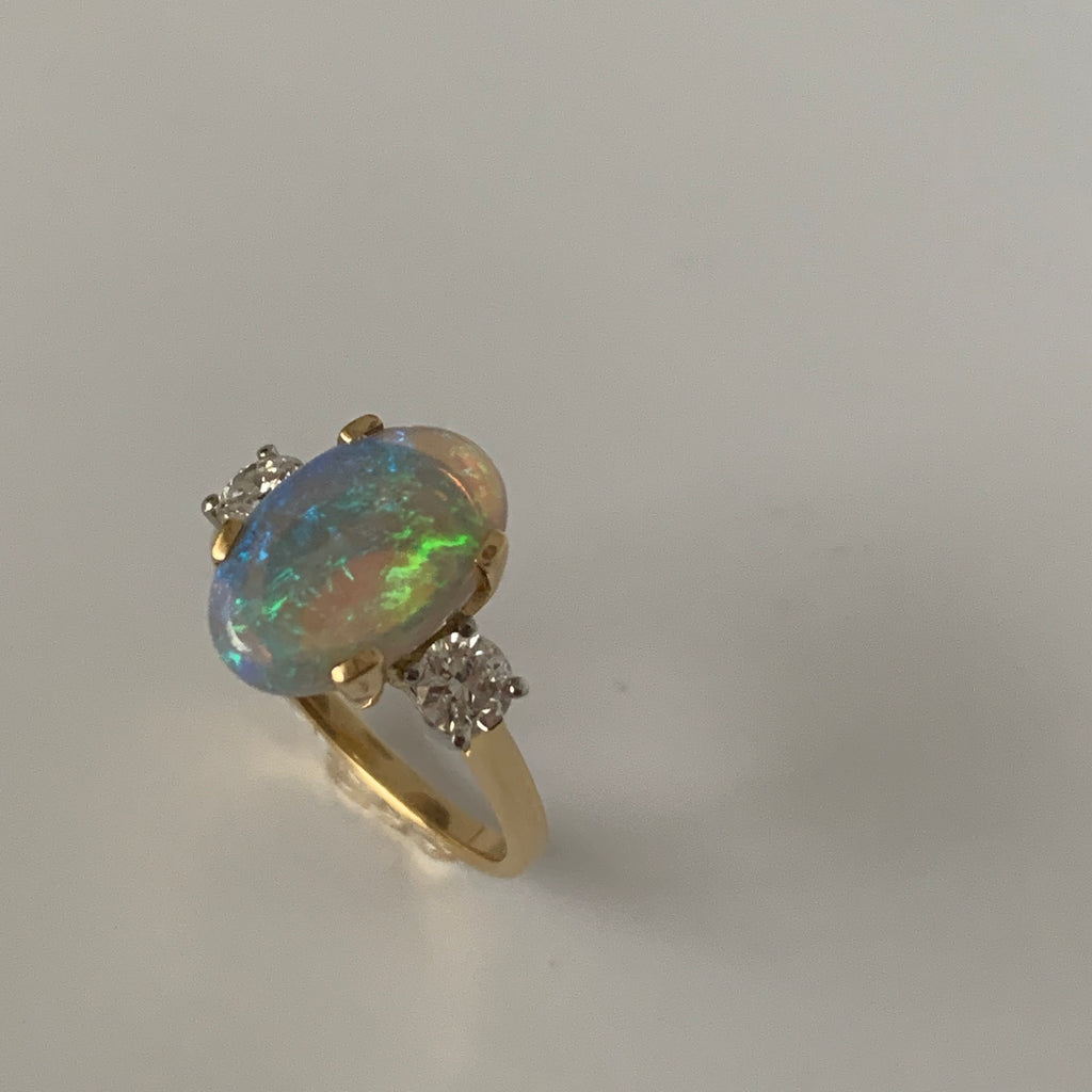 MESMERISING LIGHTNING RIDGE OPAL AND DIAMOND RING